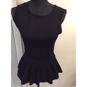 BEBE Black Peplum Ribbed Top Open Ladder Back Detail VNC Medium